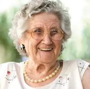 Smiling senior man sharing his positive experience with GlycoFree blood sugar support supplement